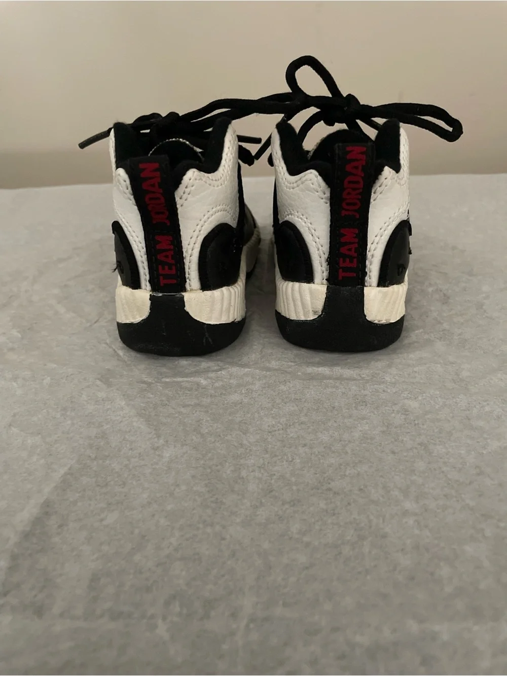 NIKE Team Jordan Baby Sneakers Black & White with Red Trim (Size 2C)